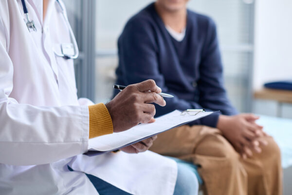 cost of car accident injuries doctor with patient
